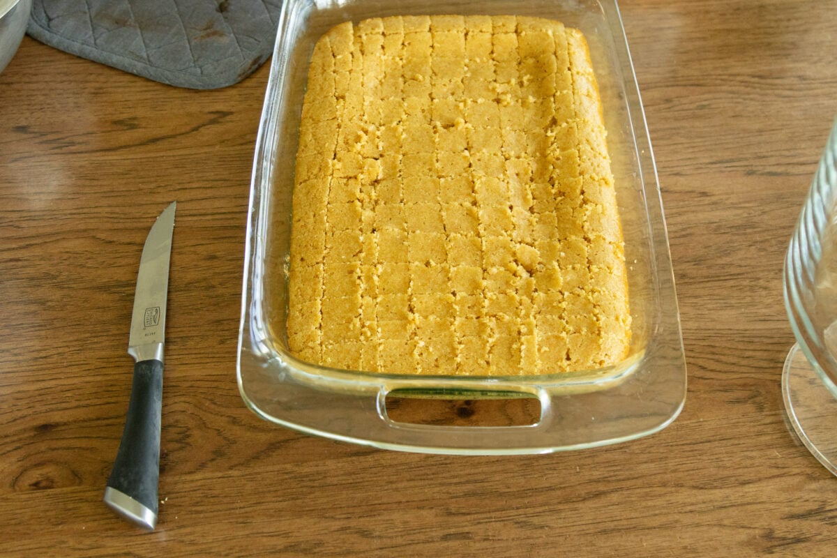 cornbread in a pan, cut into blocks