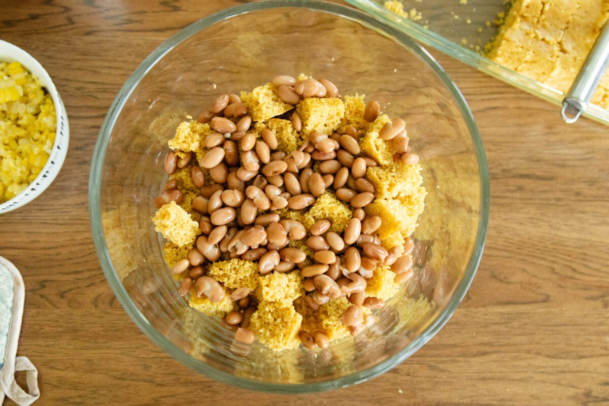 a layer of beans in the salad bowl
