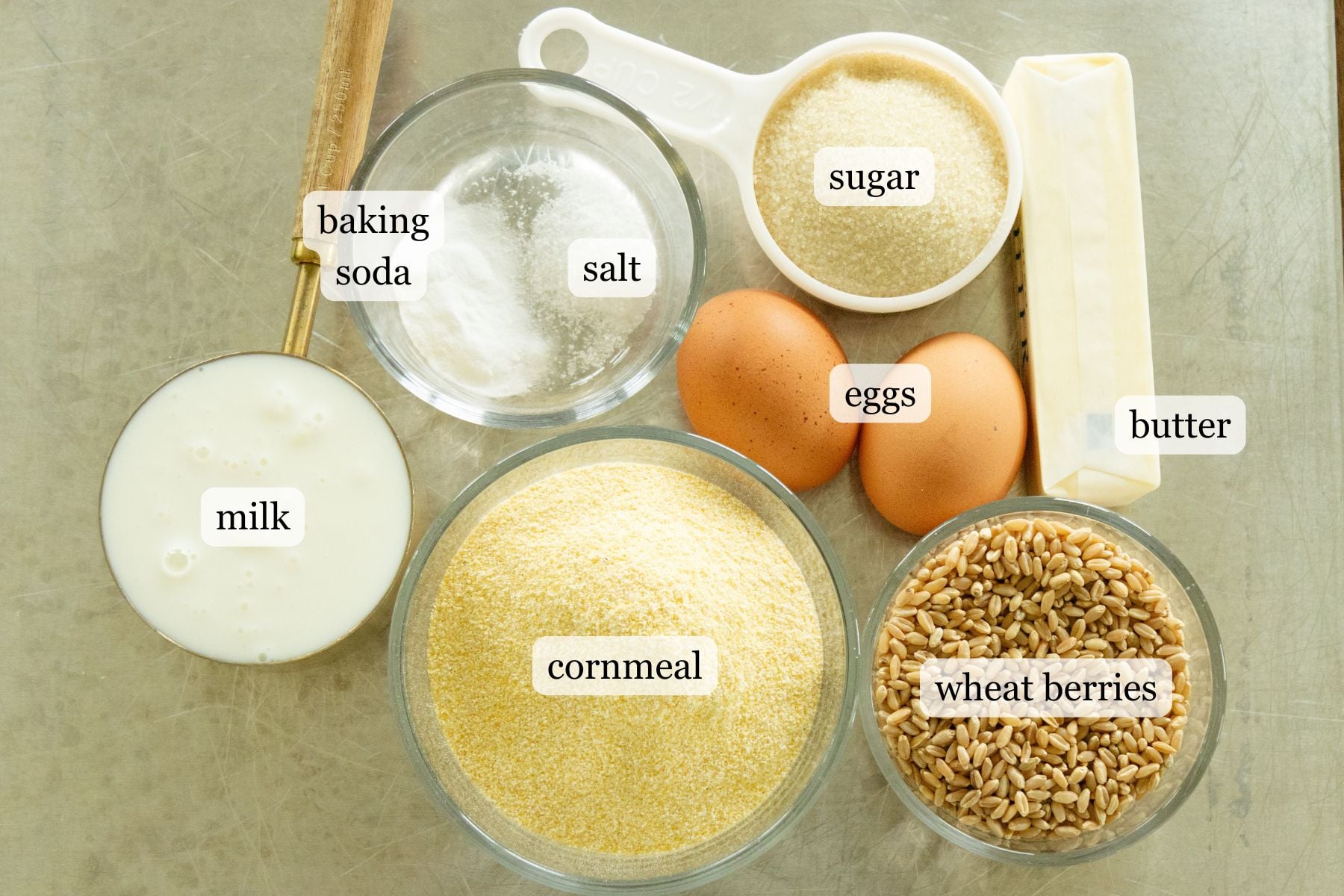 ingredients for whole wheat cornbread on a pan