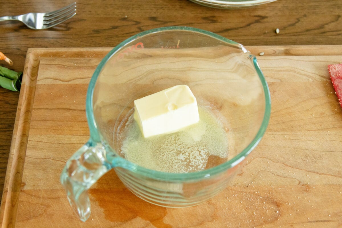 melted butter in a glass measuring cup
