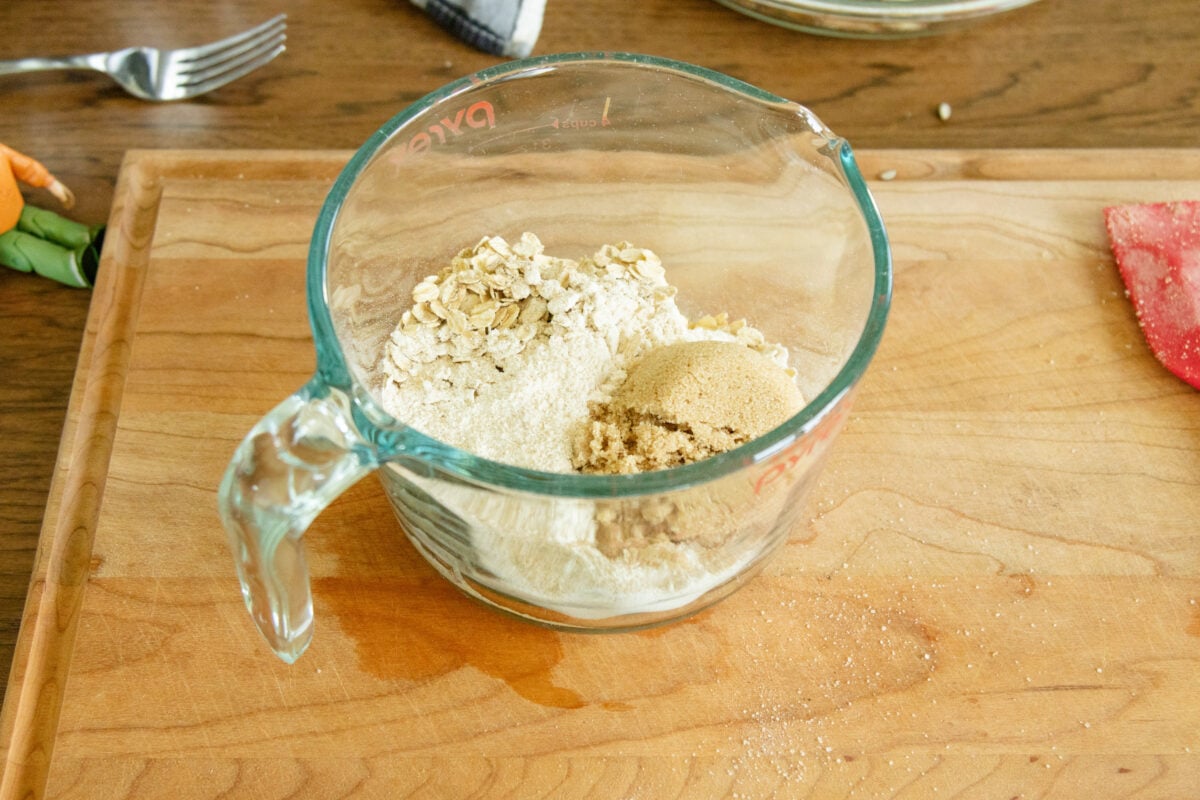 the crumble topping ingredients in a glass mixing bowl