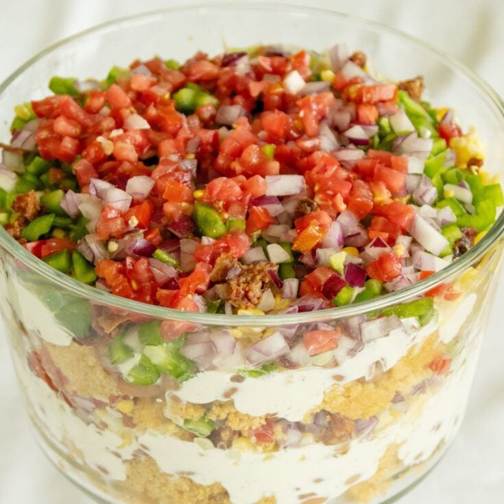 a glass bowl of cornbread salad