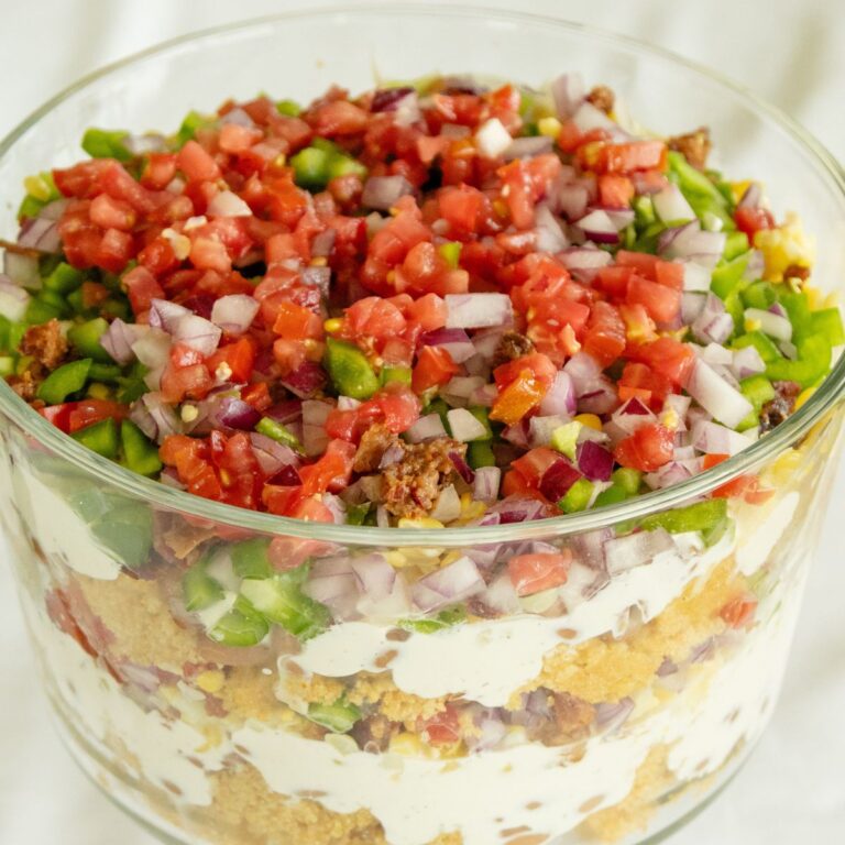a glass bowl of cornbread salad