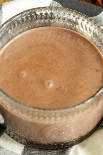 a close-up look at a mug of pumpkin spice hot cocoa
